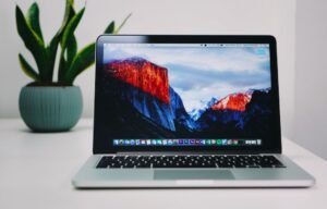 Laptop displaying applications for changing Windows 11 defaults