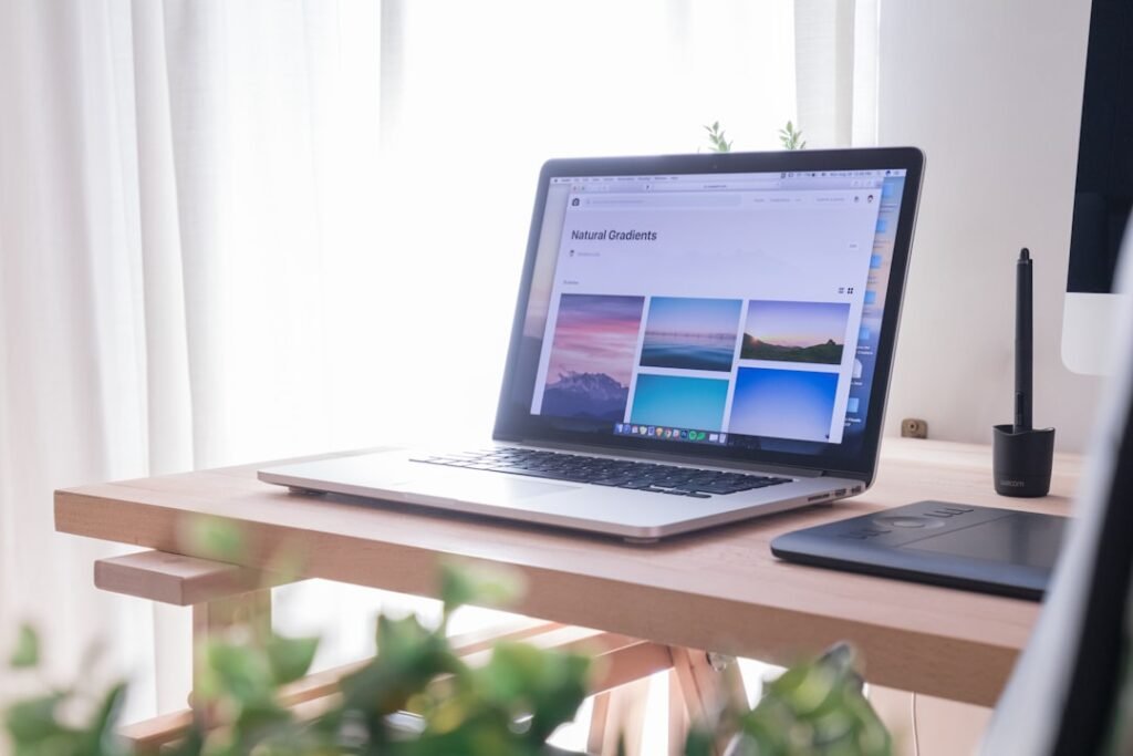 Laptop on a clean desk used to organize Chrome file downloads