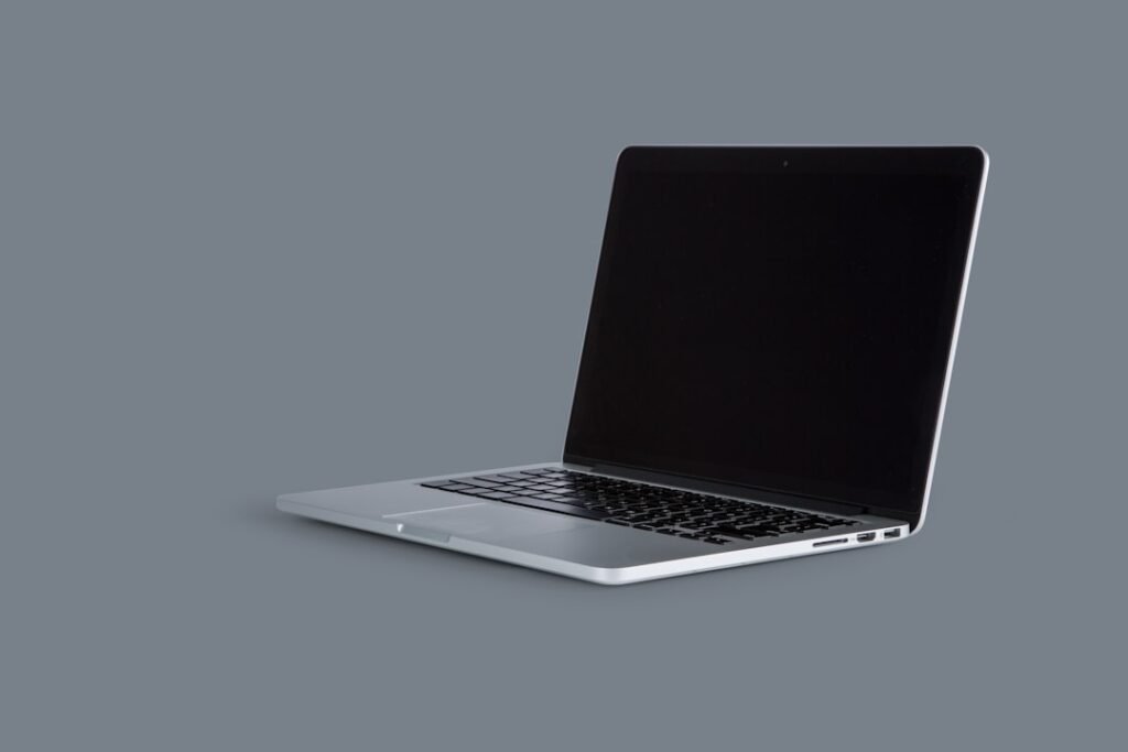 Open laptop used for Windows 11 application troubleshooting