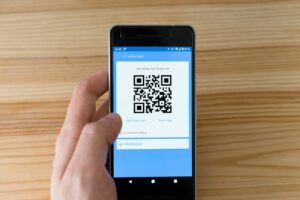 Android smartphone displaying a QR code ready to be scanned
